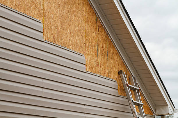 Professional Siding Repair technician working in Elliottsburg, PA